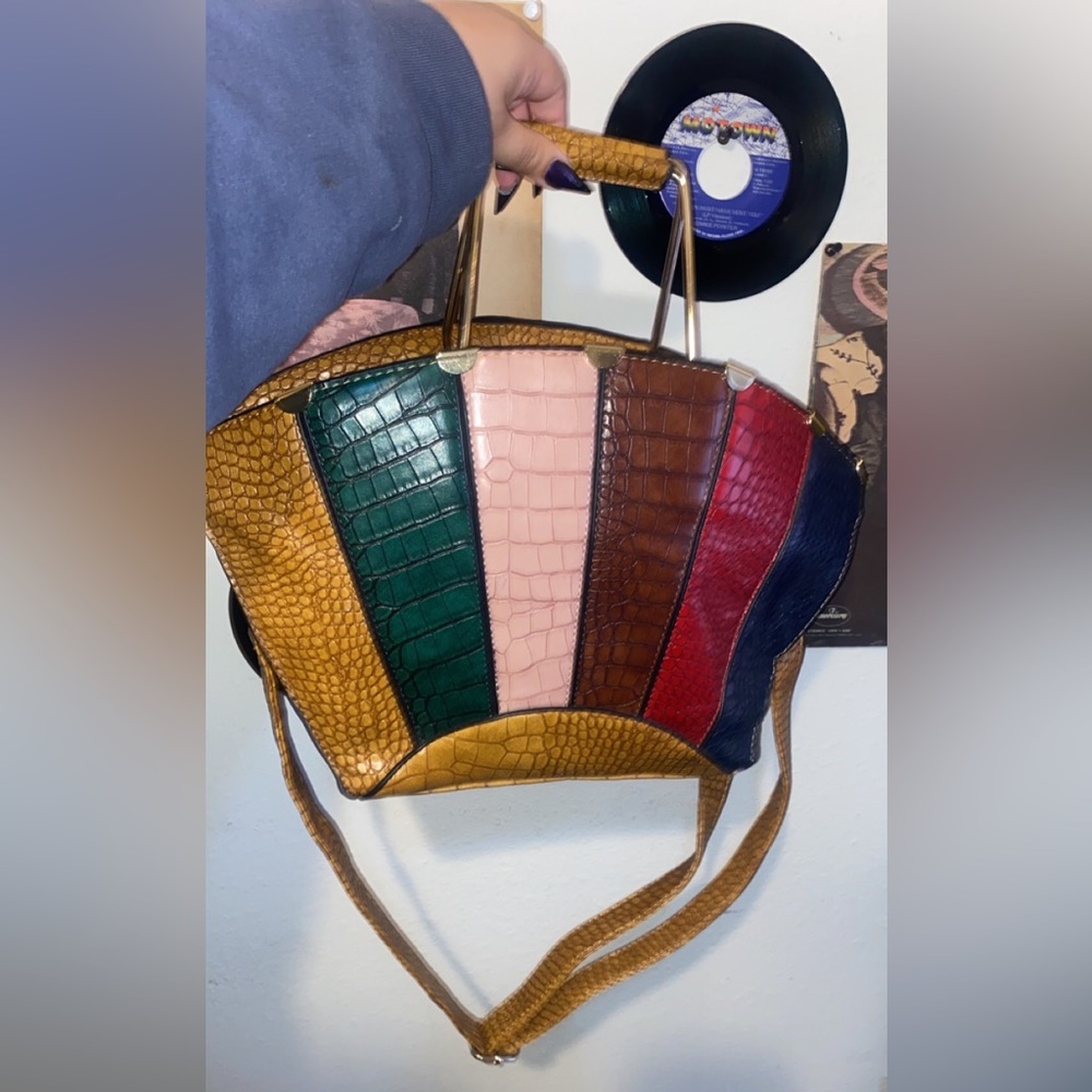 A tan multicolor purse